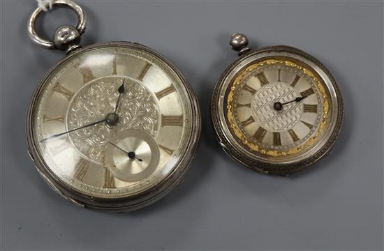 A Victorian silver pocket watch and an 800 white metal fob watch.